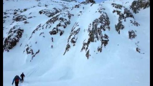 Boys skiing down a couloir. Grands Montets