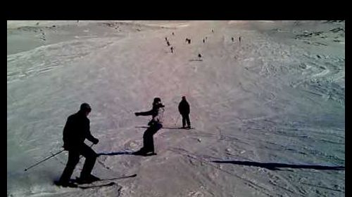 Some of the group boarding and skiing