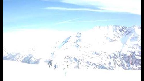 Angelo and Chloe skiing in la thuile